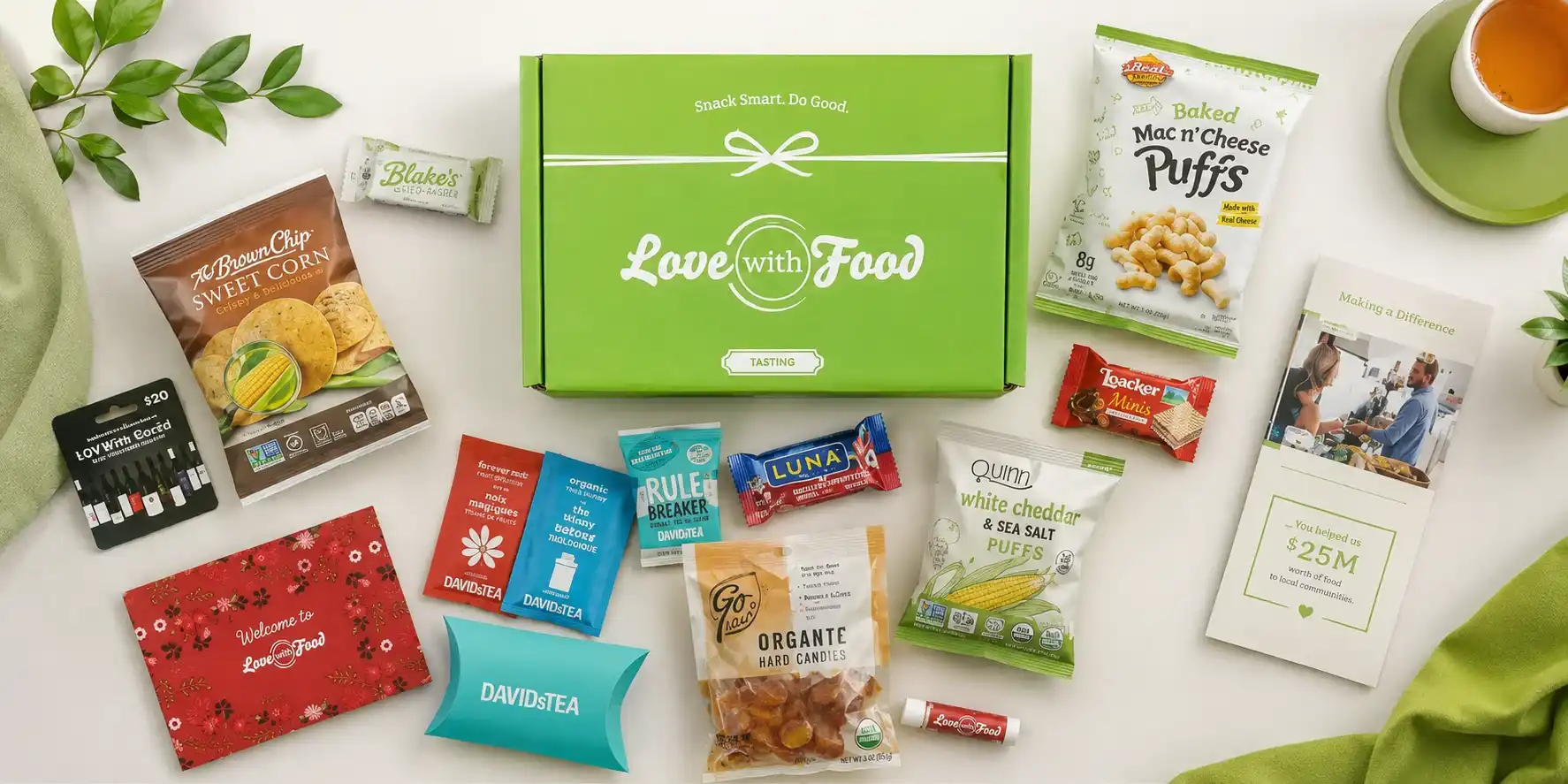 Love with Food subscription box filled with healthy snacks and tea packets