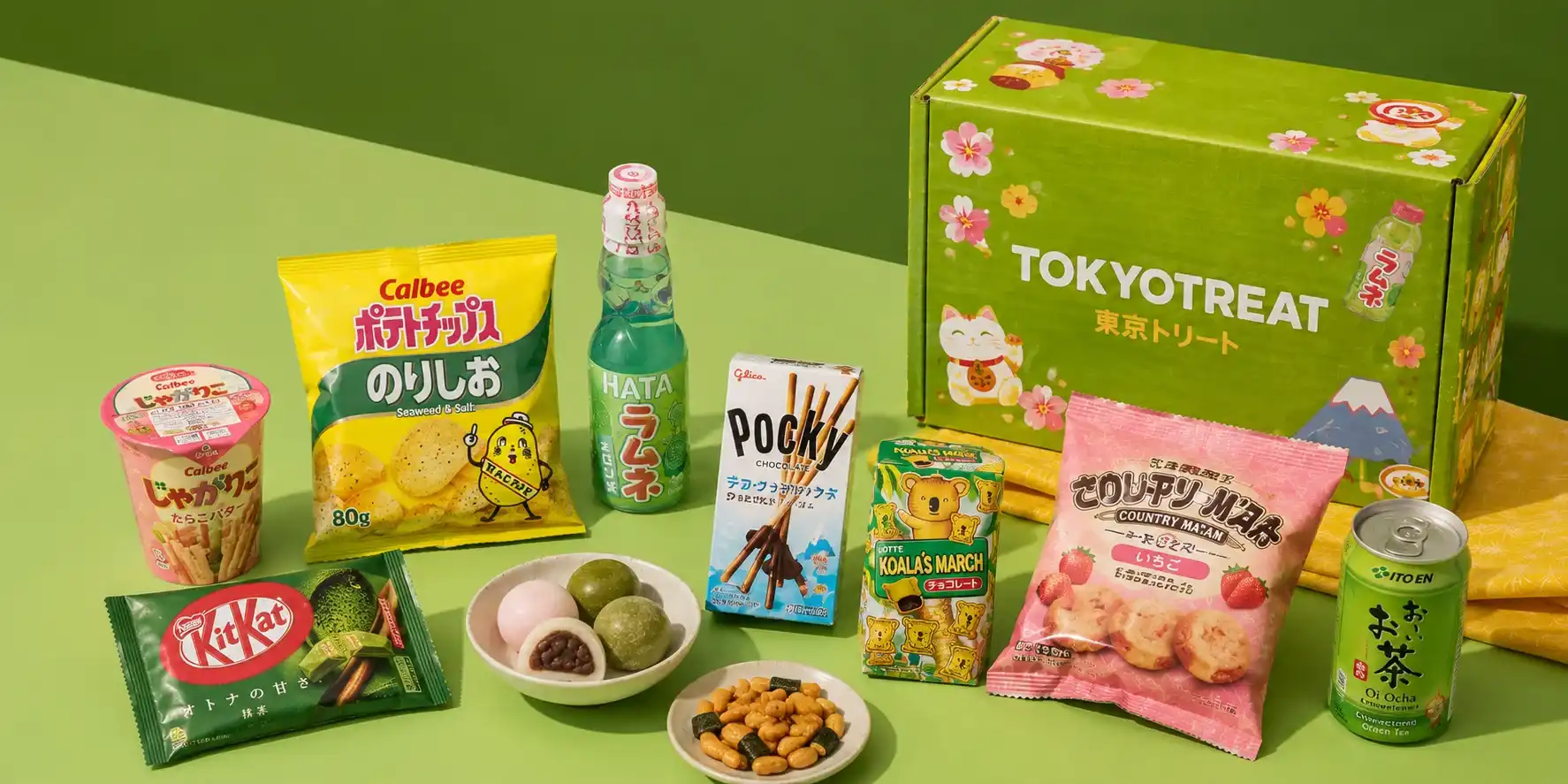 TokyoTreat subscription box with Japanese snacks, Ramune soda, and canned tea