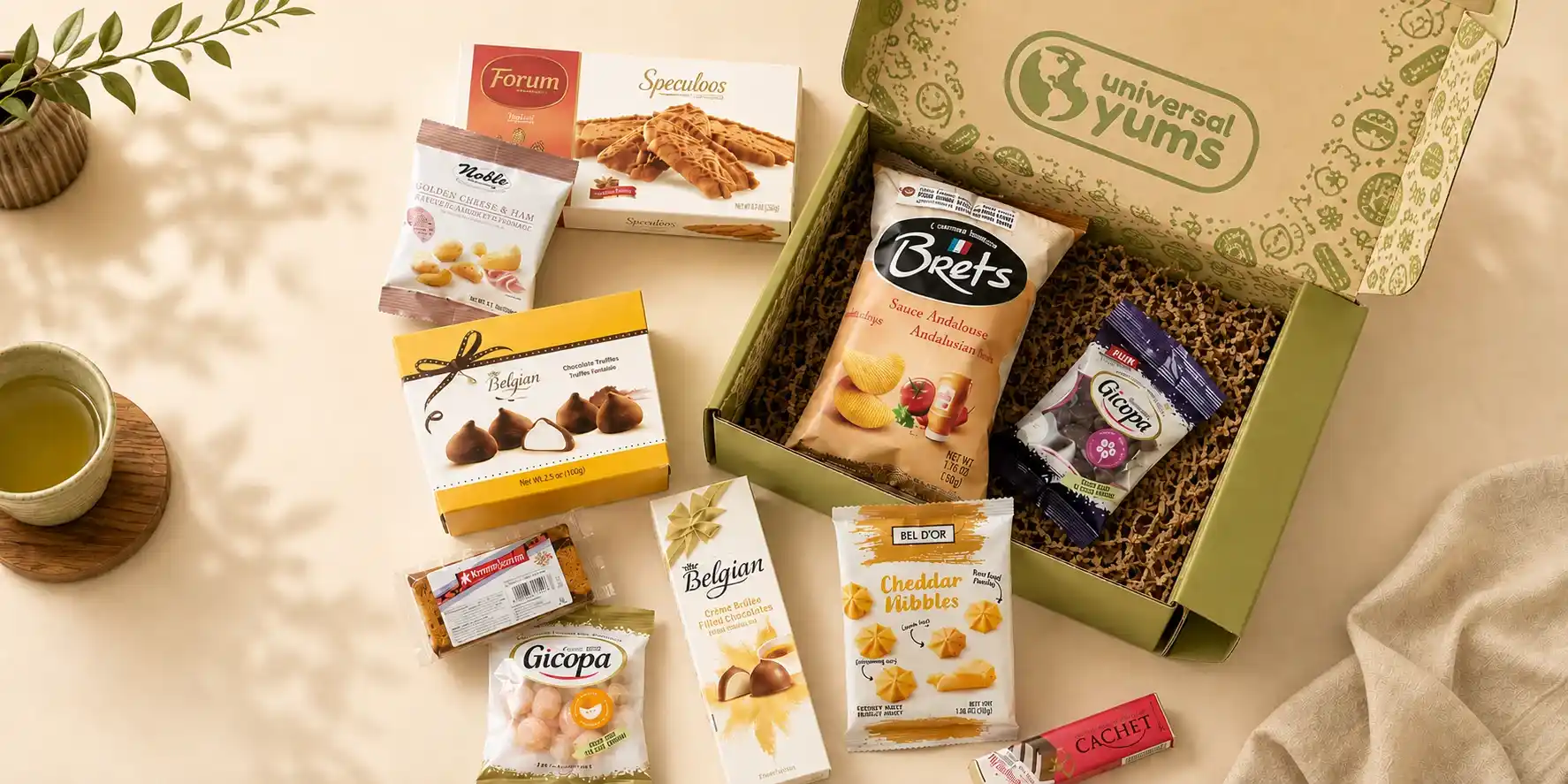 Universal Yums RETT corrugated box packed with international snacks and chocolates